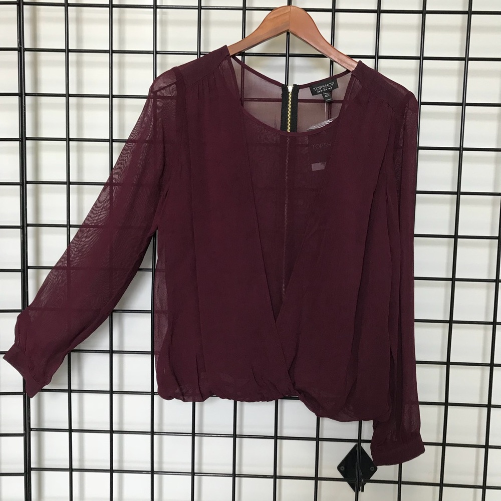 Burgundy See-through top.